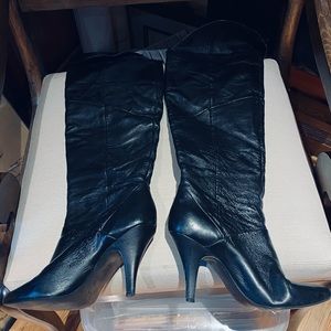 These are Guess Leather Above knee stiletto Boots.